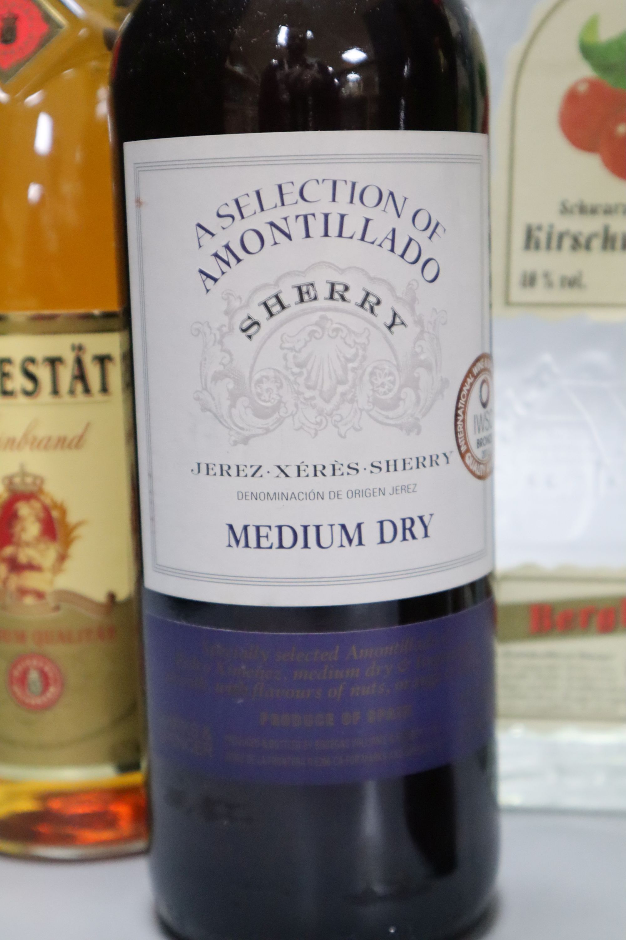 Seven various bottles of spirits, wine and sherry